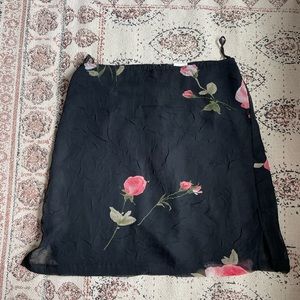 90’s black and pink slip skirt with flowers size 11/12 but fits like medium